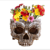Skull flower pot with flowers