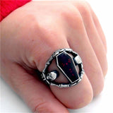 coffin ring on finger