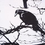 close up of raven on skull mini dress