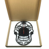 black skull wall clock in box