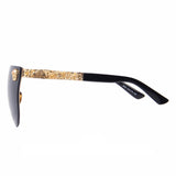Skull sunglasses gold with black lens side view