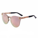 Skull sunglasses gold with pink lens