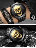 gold faced skull watch on arm